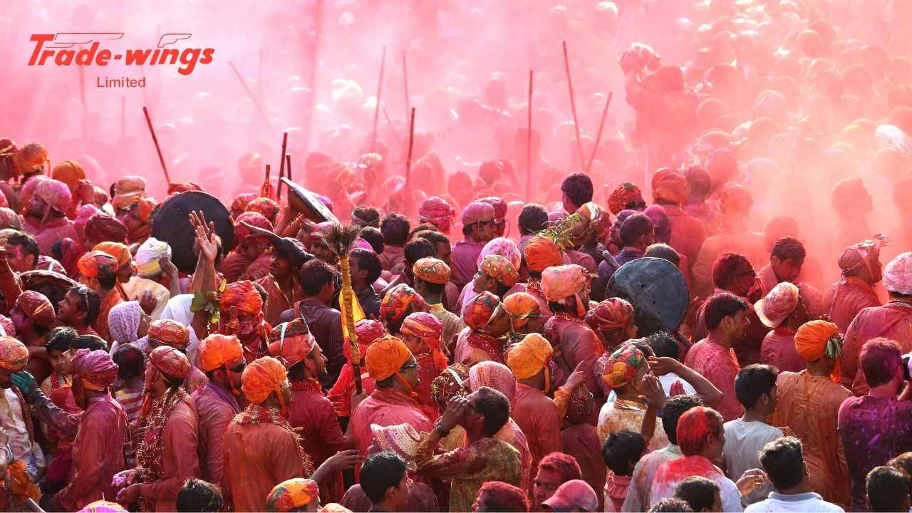 Travelers celebrating Holi festival with colors in India - Best Places to Visit for Holi 2026 in India